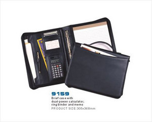 Brief case with dual-power calculator,ring binder and memo 2